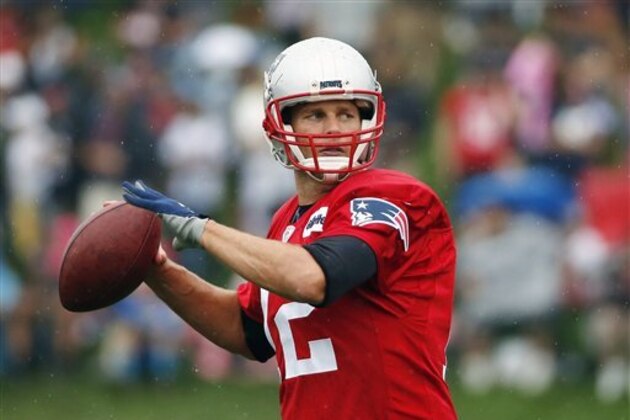 New England Patriots quarterback Tom Brady (12) passses during an NFL football training camp practice Friday, July 29, 2016, in Foxborough, Mass. (AP Photo/Michael Dwyer)