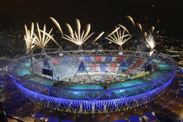 FILE - In this July 28, 2012, file photo, fireworks illuminate the sky over the Olympic Stadium during Opening Ceremonies at the 2012 Summer Olympics in London. Always splashy affairs, the parade of athletes this time around will take place Friday night, Aug. 5, 2016,  at Maracana Stadium with a country-by-country show of fashion, along with speeches, flag-raising and the lighting of the Olympic cauldron. The idea is to showcase the host country's culture, something that has earned oohhs and aahhs through time, usually also accompanied by some head-scratching as traditions and history play out. (AP Photo/Mark J. Terrill, File)