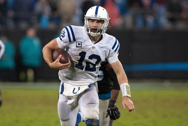 Nov 2, 2015; Charlotte, NC, USA; Indianapolis Colts quarterback Andrew Luck (12) runs the ball during overtime against the Carolina Panthers at Bank of America Stadium. Carolina defeated Indianapolis 29-26 in overtime. Mandatory Credit: Jeremy Brevard-USA TODAY Sports