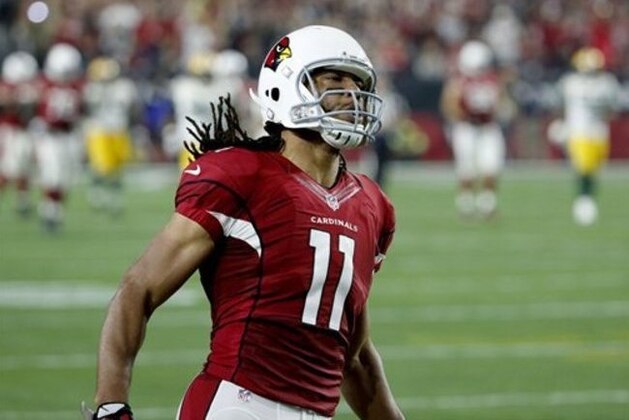 Arizona Cardinals wide receiver Larry Fitzgerald (11) celebrates a catch against the Green Bay Packers during the second half of an NFL divisional playoff football game, Saturday, Jan. 16, 2016, in Glendale, Ariz. (AP Photo/Ross D. Franklin)