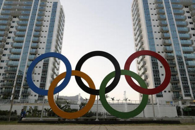 A representation of the Olympic rings are displayed  in the Olympic Village in Rio de Janeiro, Brazil, Saturday, July 23, 2016. The brand new complex of residential towers are where nearly 11,000 athletes and some 6,000 coaches and other handlers will sleep, eat and train during the upcoming games, that will kickoff on Aug. 5(AP Photo/Leo Correa)