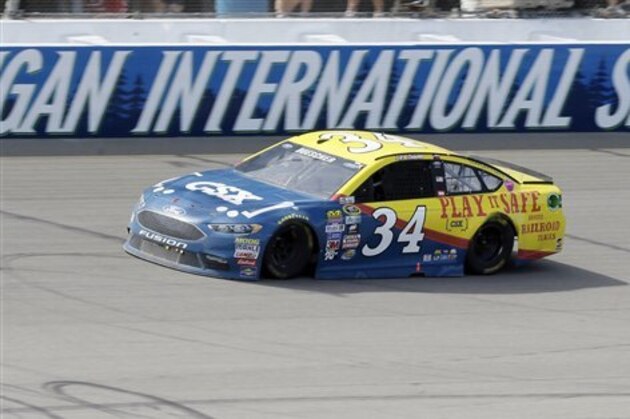 Chris Buescher drives during the NASCAR Sprint Cup series auto race at Michigan International Speedway, Sunday, June 12, 2016 in Brooklyn, Mich. (AP Photo/Carlos Osorio)