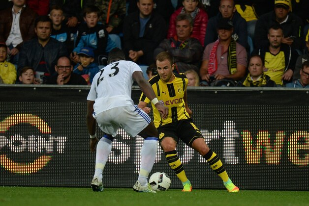 ALTACH, AUSTRIA - AUGUST 05:  Mario Goetze of Dortmund (r) challenges Lamine Kone of Sunderland during the friendly match between AFC Sunderland v Borussia Dortmund at Cashpoint Arena on August 5, 2016 in Altach, Austria.  (Photo by Deniz Calagan/Getty Images)