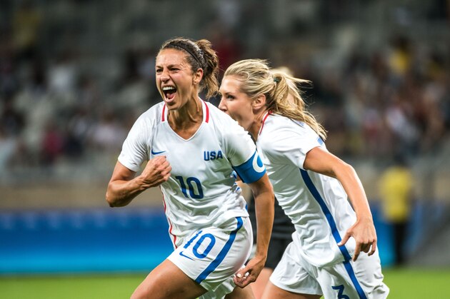 Carli Lloyd (L) of the USA celebrates her goal during a Rio 2016 Olympic Games first round Group G women's football match United States vs New Zealand at the Mineirao stadium in Belo Horizonte, Brazil on August 3, 2016. / AFP / GUSTAVO ANDRADE        (Photo credit should read GUSTAVO ANDRADE/AFP/Getty Images)