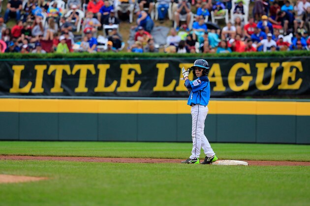 SOUTH WILLIAMSPORT, PA - AUGUST 23:  Drew Laspaluto #4 of of the West Team from Las Vegas, Nevada celebrates after hitting a three run RBI double against the Great Lakes Team from Chicago, Illinois during the first inning of the United States Championship game of the Little League World Series at Lamade Stadium on August 23, 2014 in South Williamsport, Pennsylvania.  (Photo by Rob Carr/Getty Images)