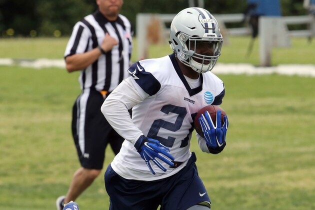 May 25, 2016; Irving, TX, USA; Dallas Cowboys running back Ezekiel Elliott (21) runs with the ball during organized team activities at Dallas Cowboys Headquarters. Mandatory Credit: Matthew Emmons-USA TODAY Sports