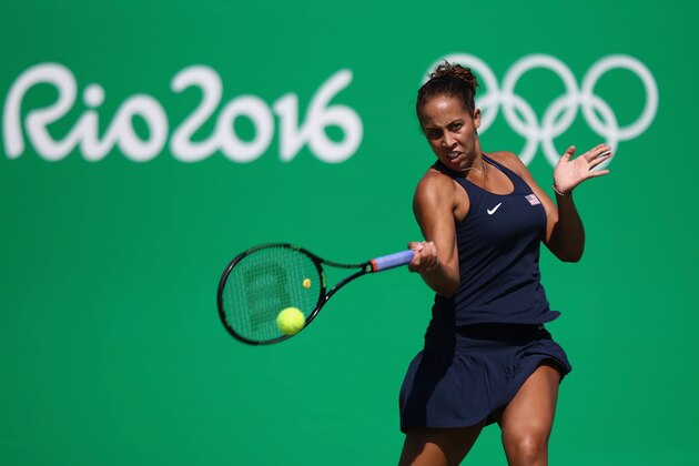 RIO DE JANEIRO, BRAZIL - AUGUST 06:  Madison Keys of USA plays a forehand in her match against Danka Kovinic of Montenegro in the women's first round on Day 1 of the Rio 2016 Olympic Games at the Olympic Tennis Centre on August 6, 2016 in Rio de Janeiro, Brazil.  (Photo by Julian Finney/Getty Images)