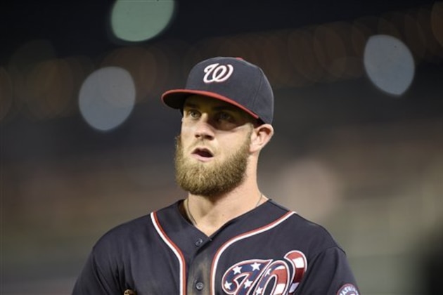 Washington Nationals' Bryce Harper looks on during a baseball game against the San Diego Padres, Friday, July 22, 2016, in Washington. The Padres won 5-3. (AP Photo/Nick Wass)