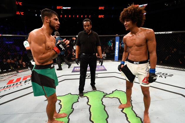 SALT LAKE CITY, UT - AUGUST 06:  (L-R) Yair Rodriguez of Mexico and Alex Caceres bow to each other after their featherweight bout during the UFC Fight Night event at Vivint Smart Home Arena on August 6, 2016 in Salt Lake City, Utah. (Photo by Jeff Bottari/Zuffa LLC/Zuffa LLC via Getty Images)