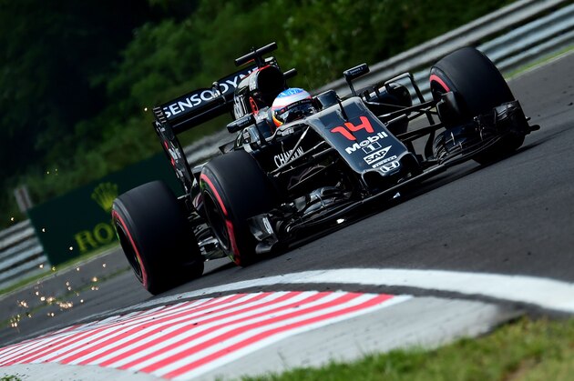 McLaren Honda's Spanish driver Fernando Alonso races during the free practice session ahead of the Formula One Hungarian Grand Prix at the Hungaroring circuit in Mogyorod near Budapest, Hungary, on July 23, 2016. / AFP / ATTILA KISBENEDEK        (Photo credit should read ATTILA KISBENEDEK/AFP/Getty Images)