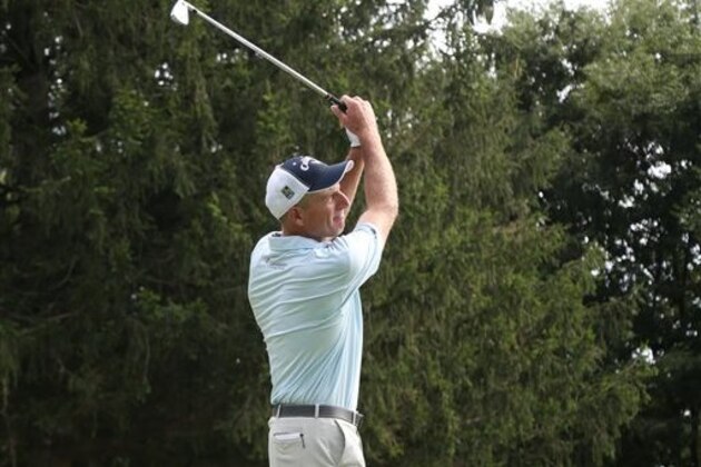 Jim Furyk watches his tee shot on the ninth hole during the first round of the PGA Championship golf tournament at Baltusrol Golf Club in Springfield, N.J., Thursday, July 28, 2016. (AP Photo/Seth Wenig)