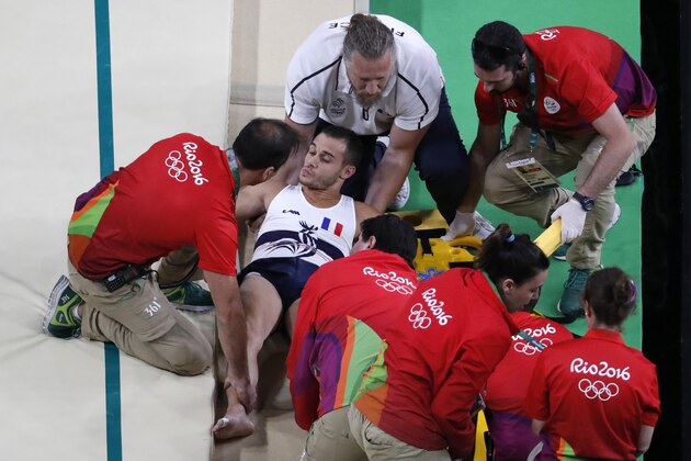France's Samir Ait Said is stretchered off after being injured while competing in the qualifying for the men's vault event of the Artistic Gymnastics at the Olympic Arena during the Rio 2016 Olympic Games in Rio de Janeiro on August 6, 2016. / AFP / Thomas COEX        (Photo credit should read THOMAS COEX/AFP/Getty Images)