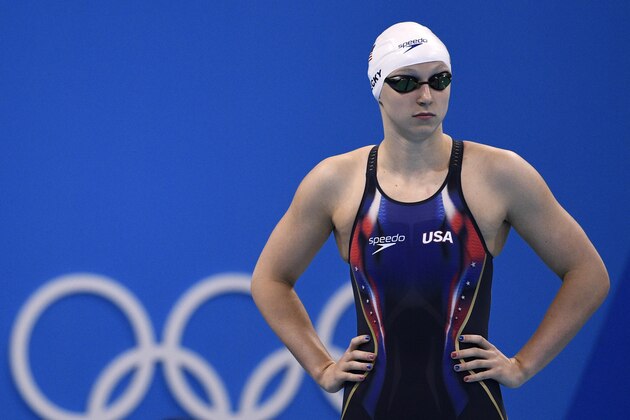 USA's Katie Ledecky prepares to compete in the Women's 400m Freestyle heats during the swimming event at the Rio 2016 Olympic Games at the Olympic Aquatics Stadium in Rio de Janeiro on August 7, 2016.   / AFP / Martin BUREAU        (Photo credit should read MARTIN BUREAU/AFP/Getty Images)