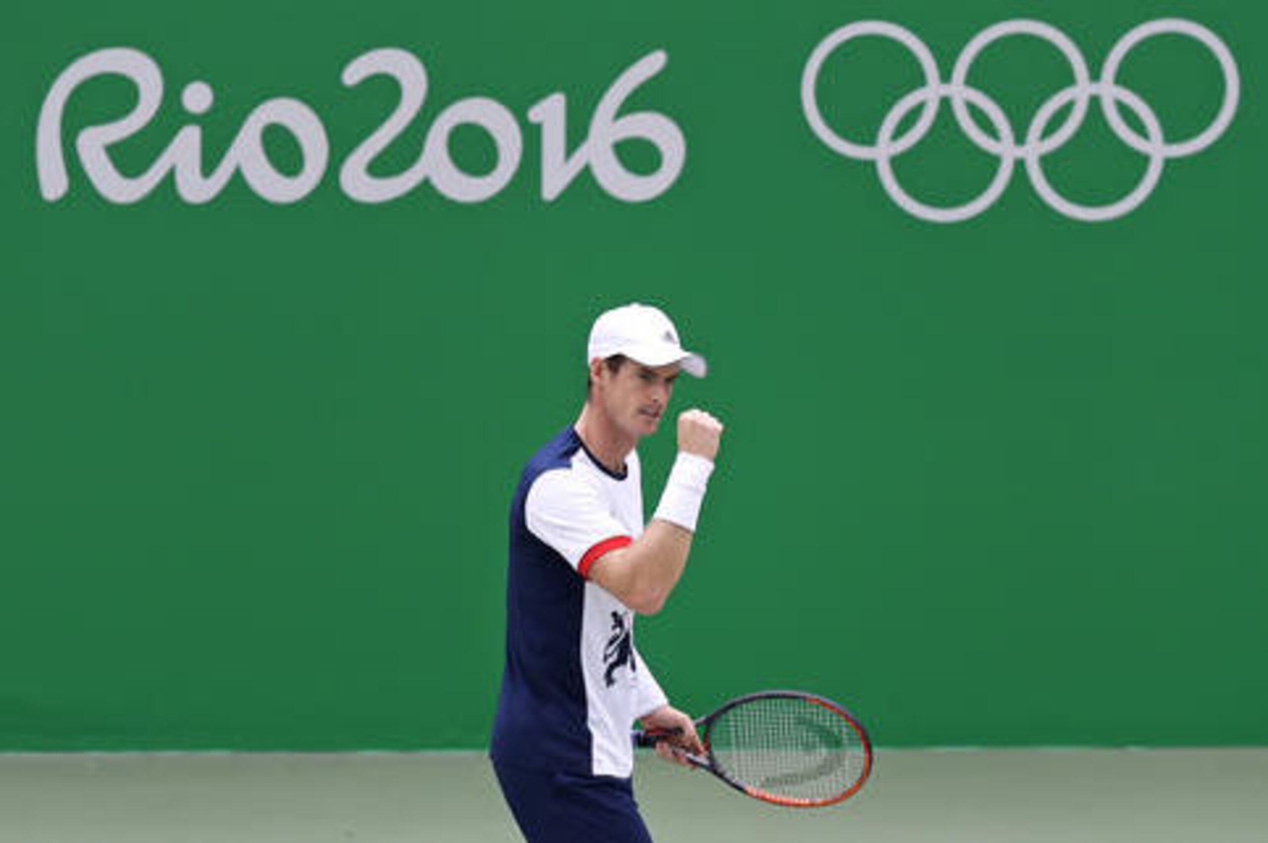 Andy Murray, of England, pumps his fist after winning a point against Viktor Troicki, of Serbia, at the 2016 Summer Olympics in Rio de Janeiro, Brazil, Sunday, Aug. 7, 2016. (AP Photo/Charles Krupa)