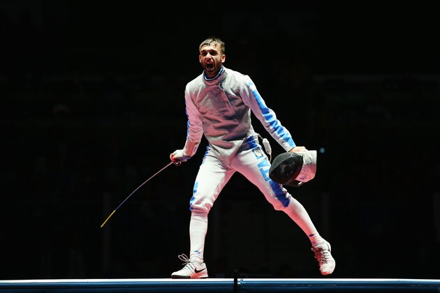 RIO DE JANEIRO, BRAZIL - AUGUST 07: Daniele Garozzo of Italy celebrates victory over Alexander Massialas of the United States during Men's Individual Foil Final on Day 2 of the Rio 2016 Olympic Games at Carioca Arena 3 on August 7, 2016 in Rio de Janeiro, Brazil. (Photo by Alex Livesey/Getty Images) RIO DE JANEIRO, BRAZIL - AUGUST 07: Daniele Garozzo of Italy celebrates victory over Alexander Massialas of the United States during Men's Individual Foil Final on Day 2 of the Rio 2016 Olympic Games at Carioca Arena 3 on August 7, 2016 in Rio de Janeiro, Brazil. (Photo by Alex Livesey/Getty Images)