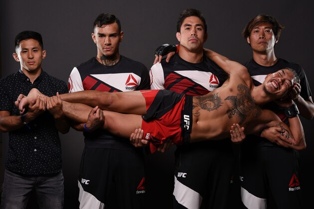 SALT LAKE CITY, UT - AUGUST 06:  Teruto Ishihara of Japan poses for a portrait with his team backstage during the UFC Fight Night event at Vivint Smart Home Arena on August 6, 2016 in Salt Lake City, Utah. (Photo by Mike Roach/Zuffa LLC/Zuffa LLC via Getty Images)