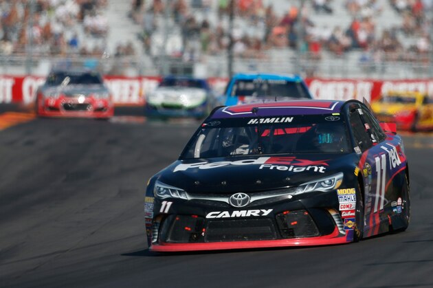 WATKINS GLEN, NY - AUGUST 07:  Denny Hamlin, driver of the #11 FedEx Freight Toyota, races during the NASCAR Sprint Cup Series Cheez-It 355 at Watkins Glen International on August 7, 2016 in Watkins Glen, New York.  (Photo by Matt Sullivan/Getty Images)