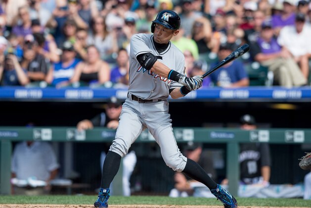DENVER, CO - AUGUST 7: Ichiro Suzuki #51 of the Miami Marlins hits a triple off of Chris Rusin #52 of the Colorado Rockies for the 3,000th hit of his major league career in the seventh inning of a game at Coors Field on August 7, 2016 in Denver, Colorado.  (Photo by Dustin Bradford/Getty Images)