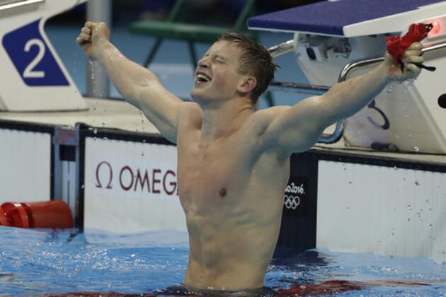 Britain's Adam Peaty celebrates winning the gold medal in the men's 100-meter breaststroke setting a new world record during the swimming competitions at the 2016 Summer Olympics, Sunday, Aug. 7, 2016, in Rio de Janeiro, Brazil. (AP Photo/Matt Slocum) Britain's Adam Peaty celebrates winning the gold medal in the men's 100-meter breaststroke setting a new world record during the swimming competitions at the 2016 Summer Olympics, Sunday, Aug. 7, 2016, in Rio de Janeiro, Brazil. (AP Photo/Matt Slocum)
