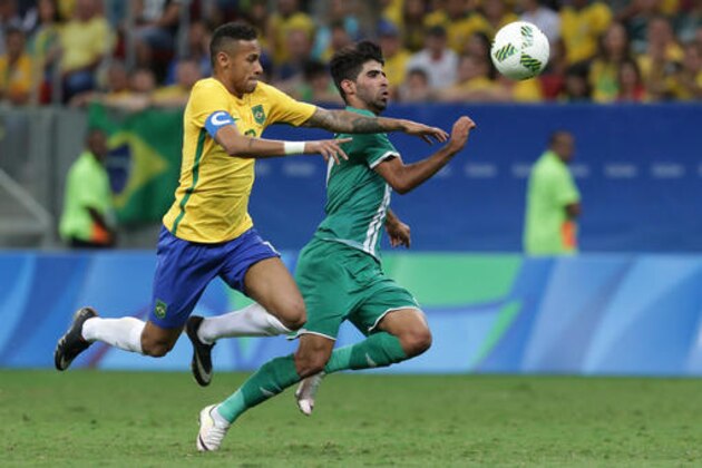 Brazil's Neymar, left, and Iraq's Alaa Ali vie for the ball during a group A match of the men's Olympic football tournament between Brazil and Iraq at the National Stadium in Brasilia, Brazil, Sunday, Aug. 7, 2016. (AP Photo/Eraldo Peres)