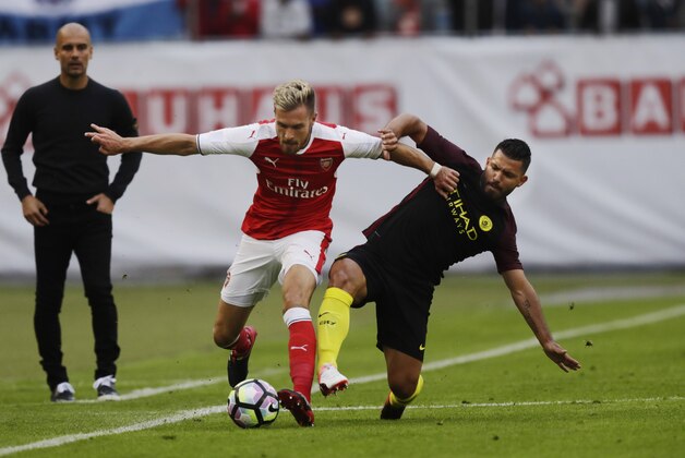 GOTHENBURG, SWEDEN - AUGUST 07: Aaron Ramsey of Arsenal and Sergio Aguero of Manchester City during the Pre-Season Friendly between Arsenal and Manchester City at Ullevi on August 7, 2016 in Gothenburg, Sweden. (Photo by Nils Petter Nilsson/Ombrello/Getty Images)