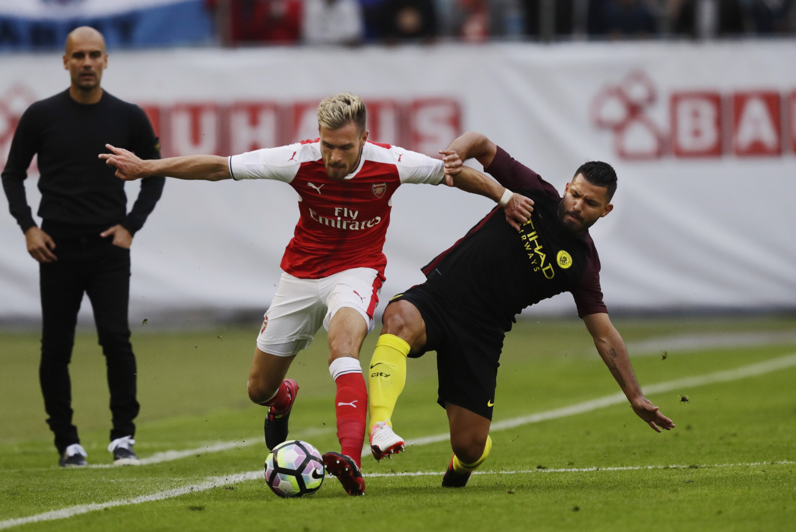 GOTHENBURG, SWEDEN - AUGUST 07: Aaron Ramsey of Arsenal and Sergio Aguero of Manchester City during the Pre-Season Friendly between Arsenal and Manchester City at Ullevi on August 7, 2016 in Gothenburg, Sweden. (Photo by Nils Petter Nilsson/Ombrello/Getty Images)