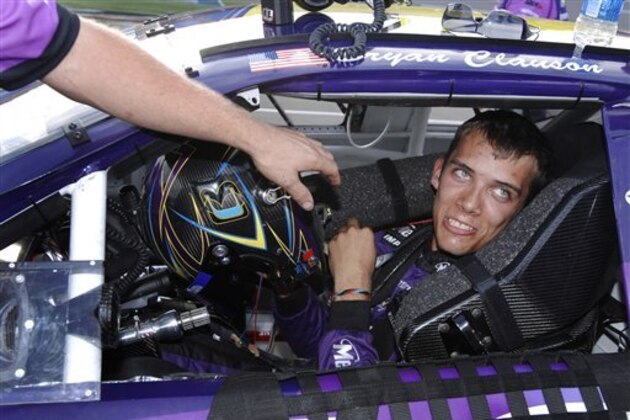 Bryan Clauson smiles in his car during qualifying for the ARCA RE/MAX Series 250 auto race, Thursday, Oct. 4, 2007, at Talladega Superspeedway in Talladega, Ala. Clauson won the pole for Friday's race. (AP Photo/Rainier Ehrhardt)