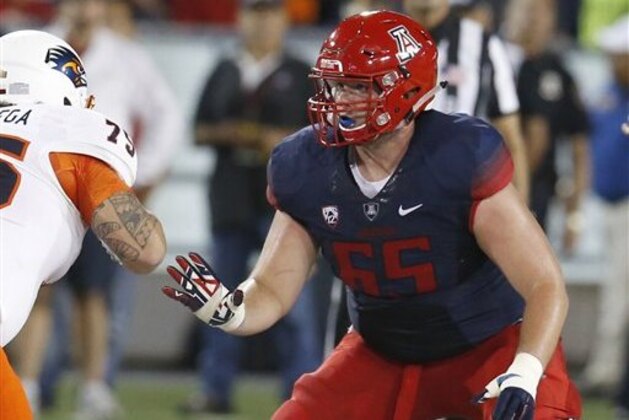 Arizona offensive lineman Zach Hemmila (65) during the first half of an NCAA college football game against UTSA, Thursday, Sept. 3, 2015, in Tucson, Ariz. (AP Photo/Rick Scuteri)