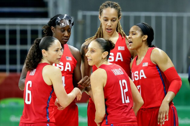 Aug 8, 2016; Rio de Janeiro, Brazil; USA guard Sue Bird (6),USA guard Diana Taurasi (12), USA forward Maya Moore (7) USA center Tina Charles (14) and USA center Brittney Griner (15) huddle up during the game against Spain during the women's basketball preliminary round in the Rio 2016 Summer Olympic Games at Youth Arena. Mandatory Credit: Matt Kryger-USA TODAY Sports