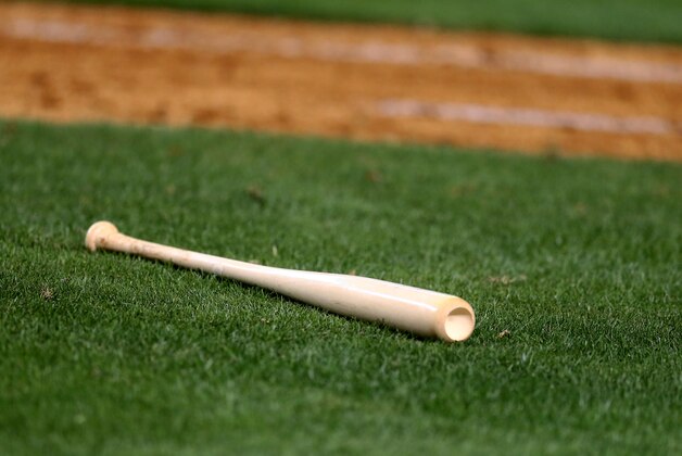 Apr 6, 2015; Phoenix, AZ, USA; Detailed view of a baseball bat laying on the field during the Arizona Diamondbacks game against the San Francisco Giants during opening day at Chase Field. Mandatory Credit: Mark J. Rebilas-USA TODAY Sports