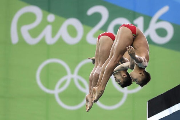 Mexico's German Sanchez and Ivan Garcia compete in the men's synchronized 10-meter platform diving final in the Maria Lenk Aquatic Center at the 2016 Summer Olympics in Rio de Janeiro, Brazil, Monday, Aug. 8, 2016. (AP Photo/Wong Maye-E)