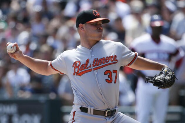 Baltimore Orioles starter Dylan Bundy throws against the Chicago White Sox during the first inning of a baseball game in Chicago, Sunday, Aug. 7, 2016. (AP Photo/Nam Y. Huh)