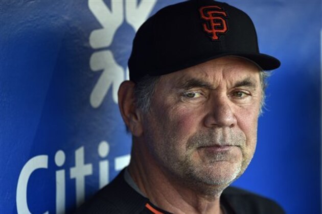 San Francisco Giants manager Bruce Bochy sits in the dugout prior to a baseball game against the Philadelphia Phillies, Tuesday, Aug. 2, 2016, in Philadelphia. (AP Photo/Derik Hamilton)