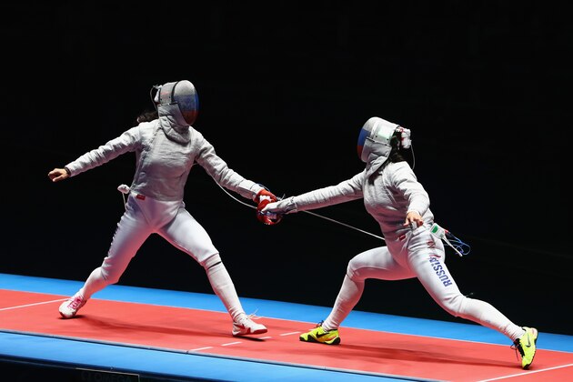 RIO DE JANEIRO, BRAZIL - AUGUST 08:  Sofya Velikaya of Russia (L) and Yana Egorian of Russia compete during the Women's Individual Sabre Gold Medal Bout on Day 3 of the Rio 2016 Olympic Games at Carioca Arena 3 on August 8, 2016 in Rio de Janeiro, Brazil.  (Photo by Dean Mouhtaropoulos/Getty Images)