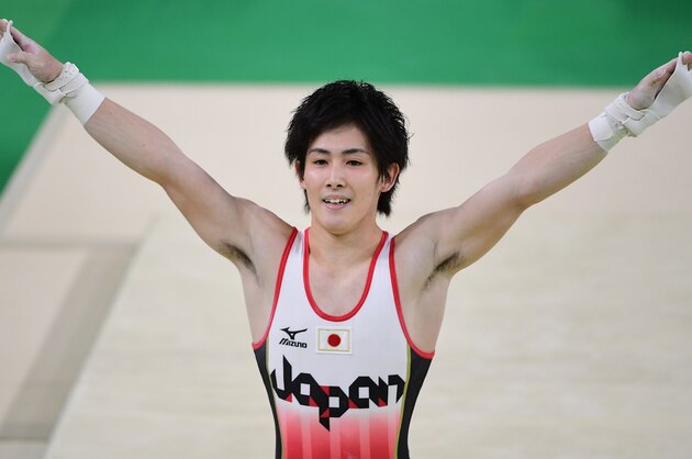 Japan's Ryohei Kato reacts after competing in the horizontal bar of the men's team final of the Artistic Gymnastics at the Olympic Arena during the Rio 2016 Olympic Games in Rio de Janeiro on August 8, 2016. / AFP / Emmanuel DUNAND (Photo credit should read EMMANUEL DUNAND/AFP/Getty Images) Japan's Ryohei Kato reacts after competing in the horizontal bar of the men's team final of the Artistic Gymnastics at the Olympic Arena during the Rio 2016 Olympic Games in Rio de Janeiro on August 8, 2016. / AFP / Emmanuel DUNAND (Photo credit should read EMMANUEL DUNAND/AFP/Getty Images)