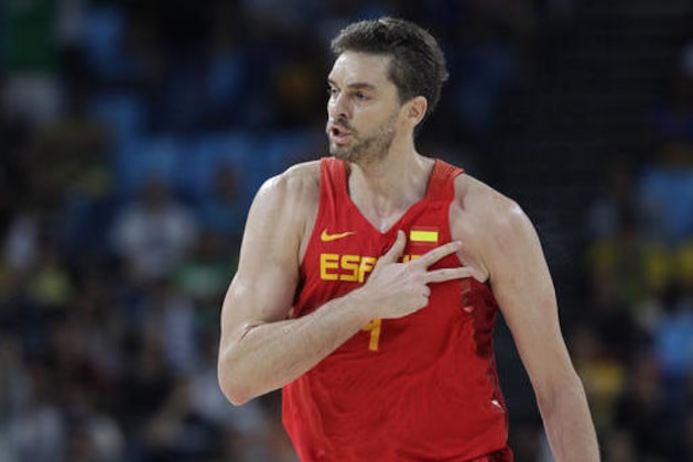 Spain's Pau Gasol (4) signals after he scores against Croatia during a men's basketball game at the 2016 Summer Olympics in Rio de Janeiro, Brazil, Sunday, Aug. 7, 2016. (AP Photo/Eric Gay)