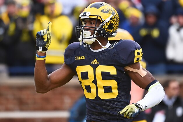 Nov 28, 2015; Ann Arbor, MI, USA; Michigan Wolverines wide receiver Jehu Chesson (86) celebrates his touchdown in the first half against the Ohio State Buckeyes at Michigan Stadium. Mandatory Credit: Tim Fuller-USA TODAY Sports