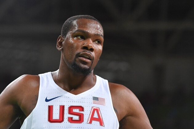 USA's guard Kevin Durant looks on during a Men's round Group A basketball match between USA and Venezuela at the Carioca Arena 1 in Rio de Janeiro on August 8, 2016 during the Rio 2016 Olympic Games. / AFP / Andrej ISAKOVIC        (Photo credit should read ANDREJ ISAKOVIC/AFP/Getty Images)