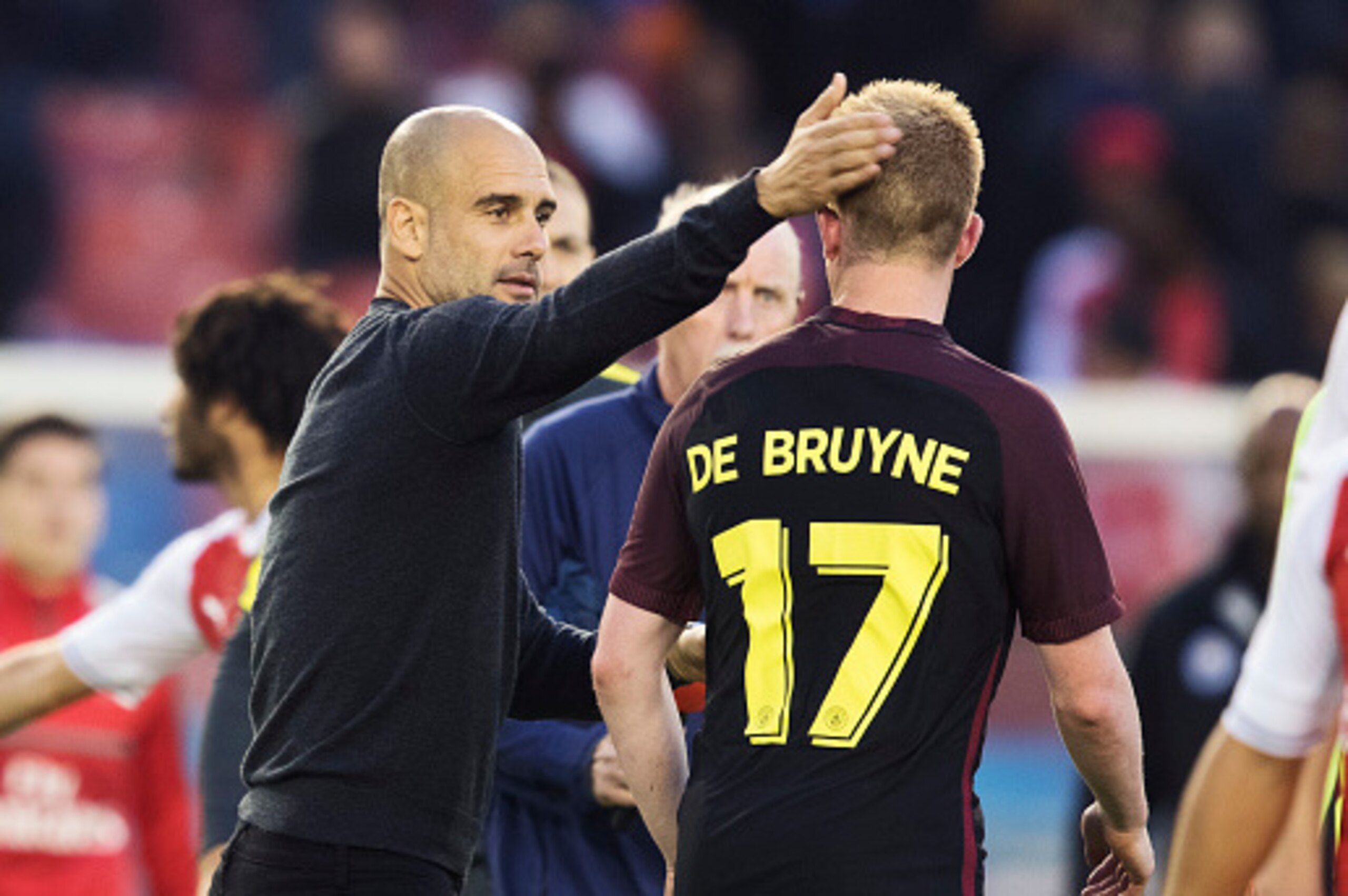 GOTHENBURG, SWEDEN - AUGUST 07: Pep Guardiola, head coach of Manchester City and Kevin de Bruyne of Manchester City during the Pre-Season Friendly between Arsenal and Manchester City at Ullevi on August 7, 2016 in Gothenburg, Sweden. (Photo by Nils Petter Nilsson/Ombrello/Getty Images)