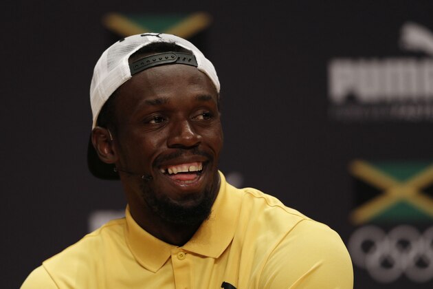 Usain Bolt smiles during a Jamaican Olympic Association and Puma press conference at the Cidade Das Artes in Rio de Janeiro on August 8, 2016.  / AFP / Adrian DENNIS        (Photo credit should read ADRIAN DENNIS/AFP/Getty Images)