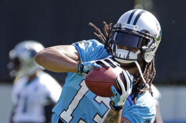 Carolina Panthers' Kelvin Benjamin (13) catches a pass during NFL football practice in Charlotte, N.C., Tuesday, May 31, 2016. (AP Photo/Chuck Burton)