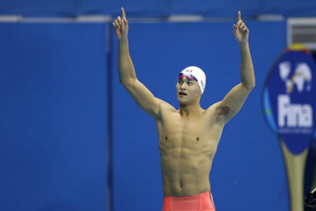 China's Sun Yang celebrates after winning the gold medal in the men's 200-meter freestyle final during the swimming competitions at the 2016 Summer Olympics, Monday, Aug. 8, 2016, in Rio de Janeiro, Brazil. (AP Photo/Michael Sohn)