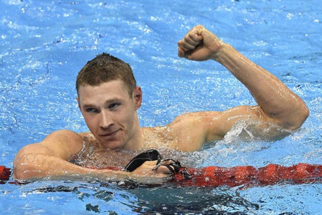 United States' Ryan Murphy celebrates after winning the gold medal in the men's 100-meter backstroke final during the swimming competitions at the 2016 Summer Olympics, Monday, Aug. 8, 2016, in Rio de Janeiro, Brazil. (AP Photo/Martin Meissner)