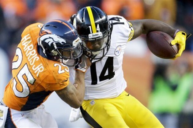 Pittsburgh Steelers wide receiver Sammie Coates, right, is tackled by Denver Broncos cornerback Chris Harris during the second half in an NFL football divisional playoff game, Sunday, Jan. 17, 2016, in Denver. (AP Photo/Joe Mahoney)