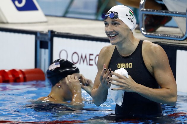 Hungary's Katinka Hosszu celebrates after she won the Women's 100m Backstroke Final during the swimming event at the Rio 2016 Olympic Games at the Olympic Aquatics Stadium in Rio de Janeiro on August 8, 2016.   / AFP / Odd Andersen        (Photo credit should read ODD ANDERSEN/AFP/Getty Images)