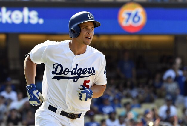 Jul 31, 2016; Los Angeles, CA, USA; Los Angeles Dodgers shortstop Corey Seager (5) run in a three run home run against the Arizona Diamondbacks during the seventh inning at Dodger Stadium. Mandatory Credit: Richard Mackson-USA TODAY Sports