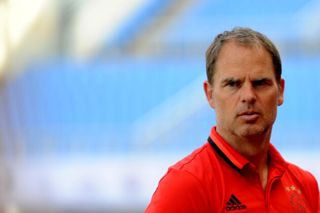 Ajax Amsterdam football club's coach Frank de Boer reacts during a training session in Shenyang, northeast China's Liaoning province on May 17, 2016. 
Ajax will play a friendly match against Chinese Super League club Liaoning Whowin FC on May 18 at  Shenyang Olympic Sports Center as part of their China tour. / AFP / STR / China OUT        (Photo credit should read STR/AFP/Getty Images)