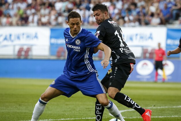 VELDEN, AUSTRIA - JULY 20:  Nemanja Matic (L) of Chelsea in action against Philipp Prosenik (L) of WAC RZ Pellets during the friendly match between WAC RZ Pellets and Chelsea F.C. at Worthersee Stadion on July 20, 2016 in Velden, Austria. (Photo by Srdjan Stevanovic/Getty Images)