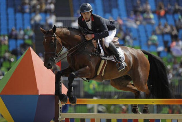 Astier Nicolas, of France, riding Piafde B'Neville, competes in the equestrian eventing team show jumping phase at the 2016 Summer Olympics in Rio de Janeiro, Brazil, Tuesday, Aug. 9, 2016. (AP Photo/John Locher)