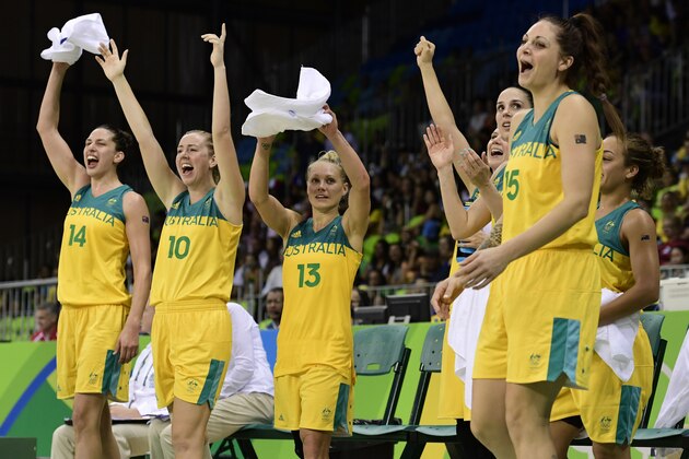 Australia players celebrate a point during a Women's round Group A basketball match between Australia and France at the Youth Arena in Rio de Janeiro on August 9, 2016 during the Rio 2016 Olympic Games. / AFP / JAVIER SORIANO        (Photo credit should read JAVIER SORIANO/AFP/Getty Images)